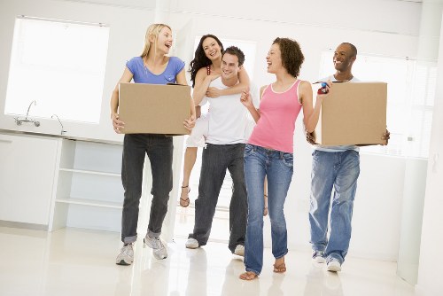 Moving team protecting furniture during a Barnet home removal