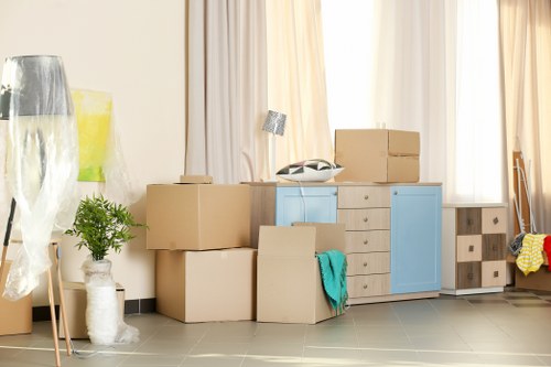 Furniture removals team loading household furniture in Barnet
