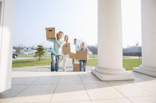 Moving crew using PPE for safe furniture transport