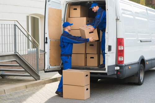 Family home move with packed boxes and furniture