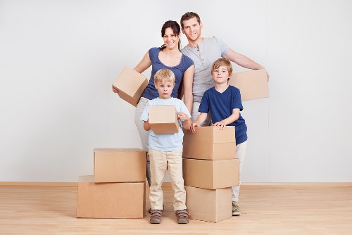 Donation-ready household furniture and boxes for charity reuse