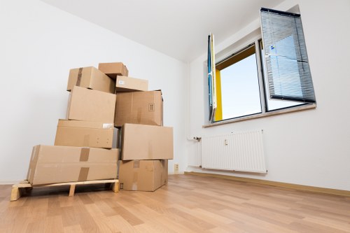 Stacked storage boxes and moving supplies for removals in Barnet