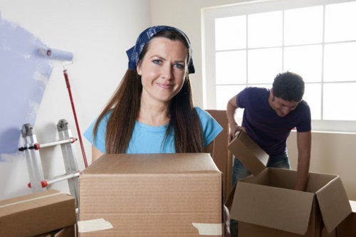 Safe and insured Barnet movers packing items for transport