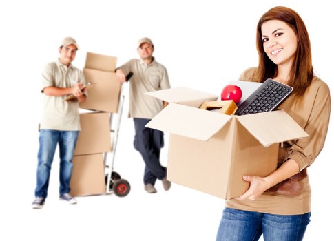 Removal staff wearing PPE during a safe moving operation