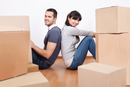 Professional movers handling furniture for a Barnet house removal