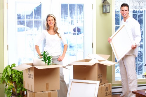 Professional Barnet man and van loading household items carefully