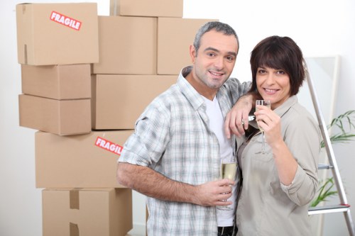 Room-by-room packing setup with labelled boxes for a Barnet house move